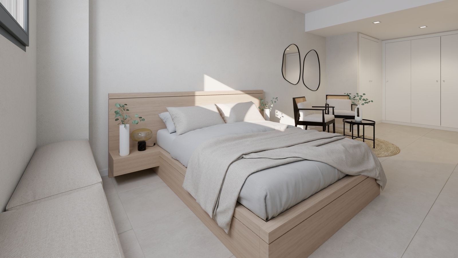 Modernes Schlafzimmer-Interieur mit Holzbett und Sitzecke.