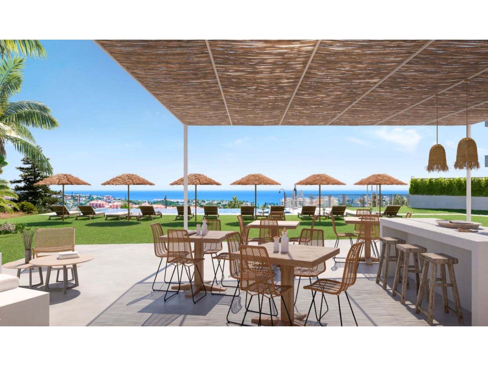 Celere Sunrise: Essbereich im Freien mit Blick auf das Meer und Liegestühle.